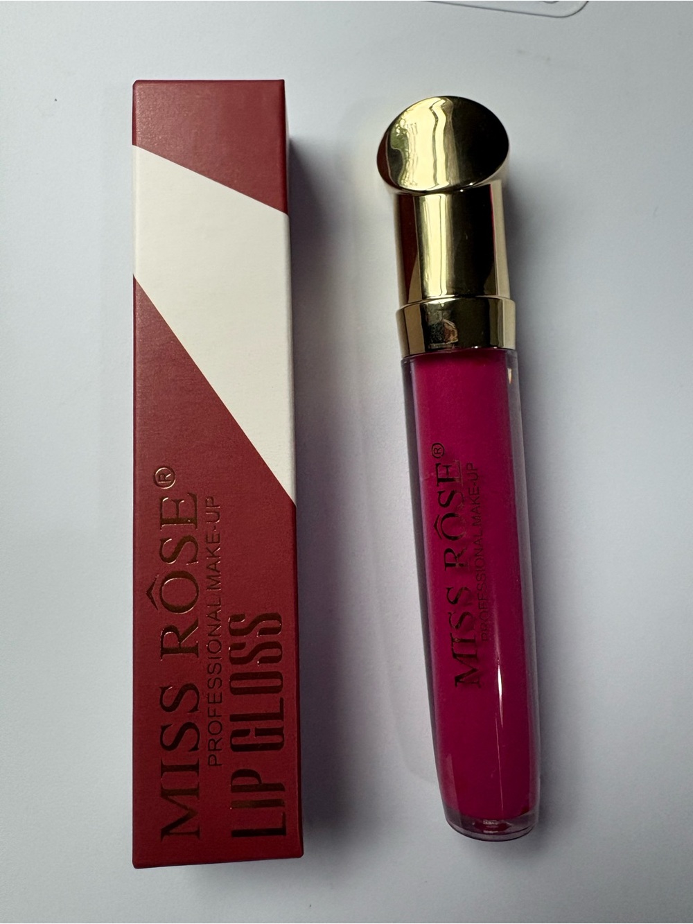 High-Shine Lip Gloss — Bold Fuchsia Pink
